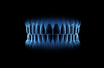 upper and lower teeth with a blue dye used in mouth cancer screening